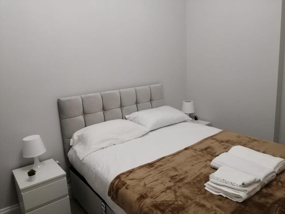 Апартаменты Cosy Entire Flat In Kings Cross Лондон